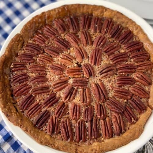 Pecan pie with pecans in concentric circles.