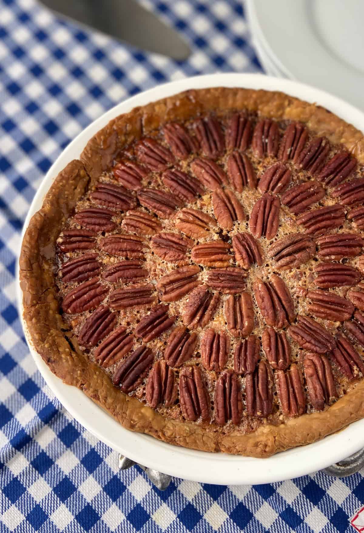 Pecan Pie in white pie dish.