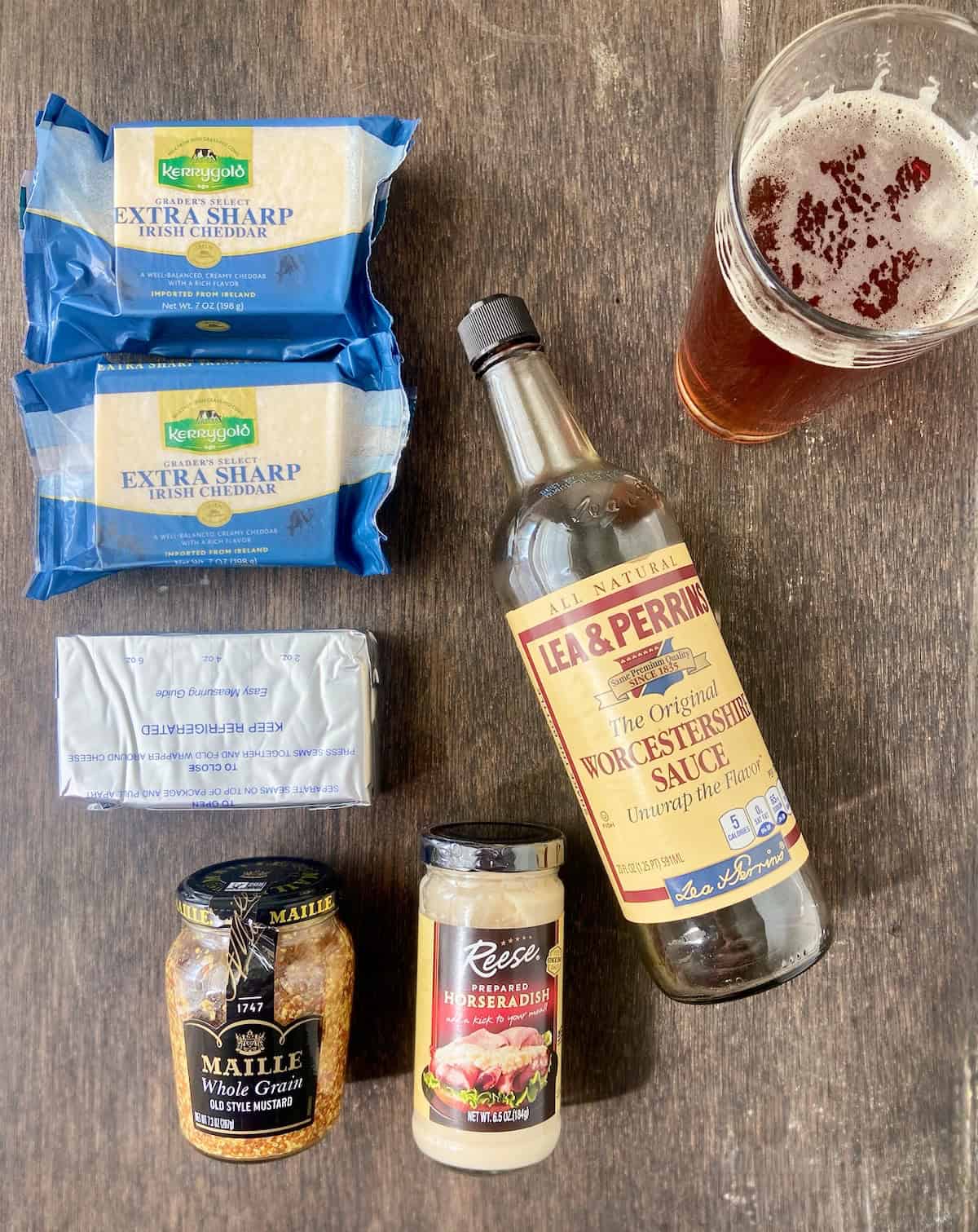 Ingredients for Irish Pub Cheese on wooden table.