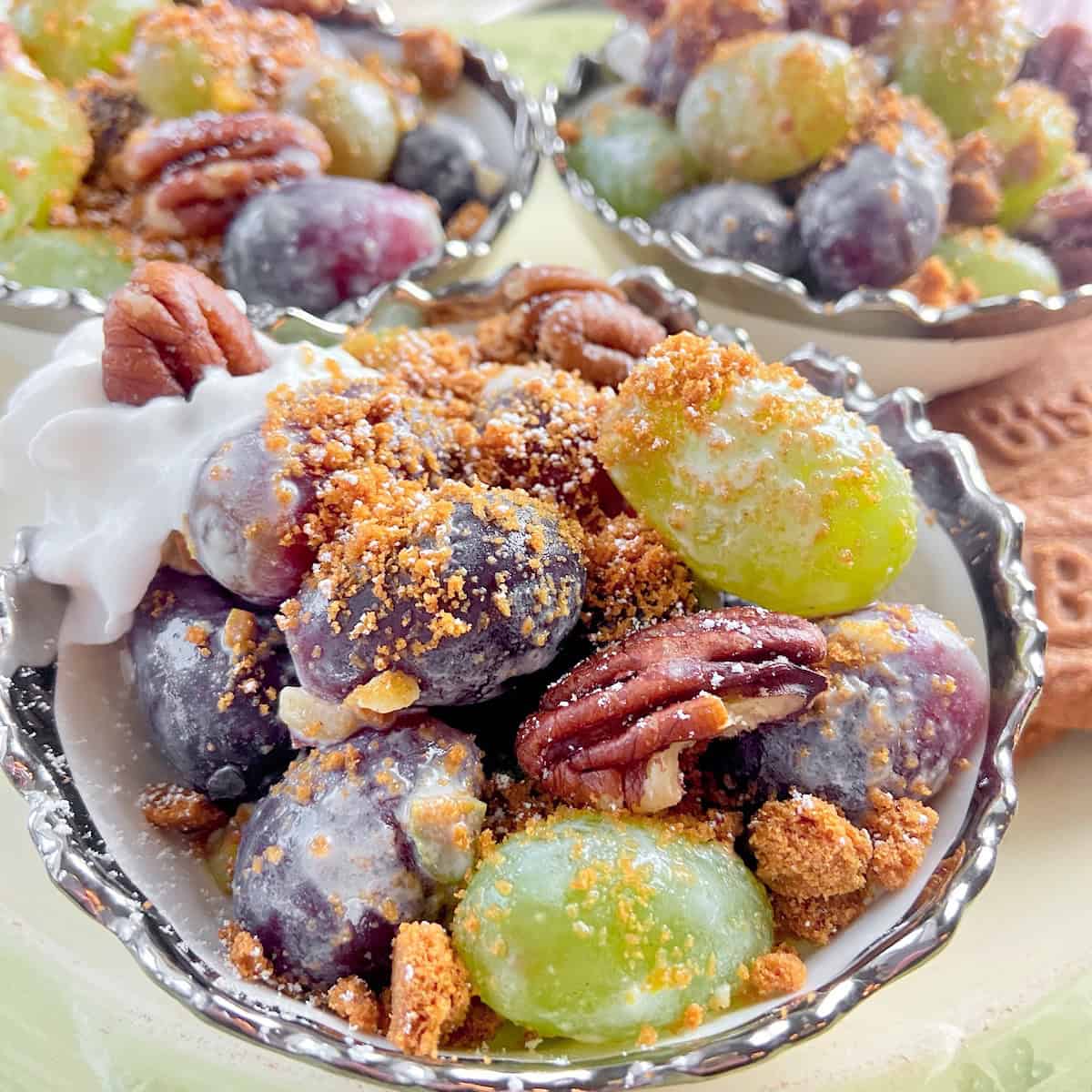 Grape salad in decorative serving bowl.