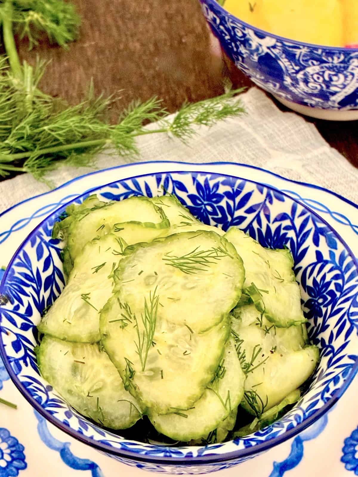 Austrian Cucumber Salad garnished with fresh dill weed.