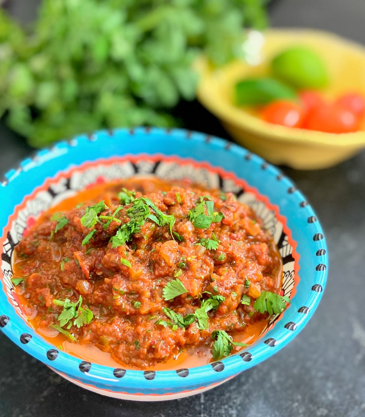 Ranchero sauce in decorative serving bowl.