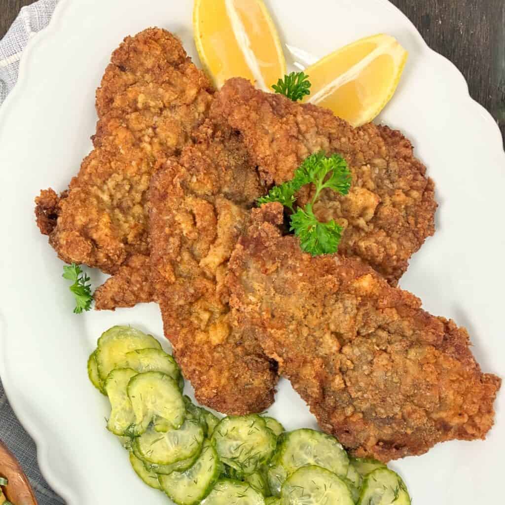 Wiener Schnitzel on platter.