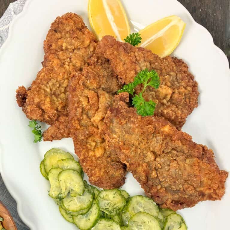 Wiener Schnitzel on platter.